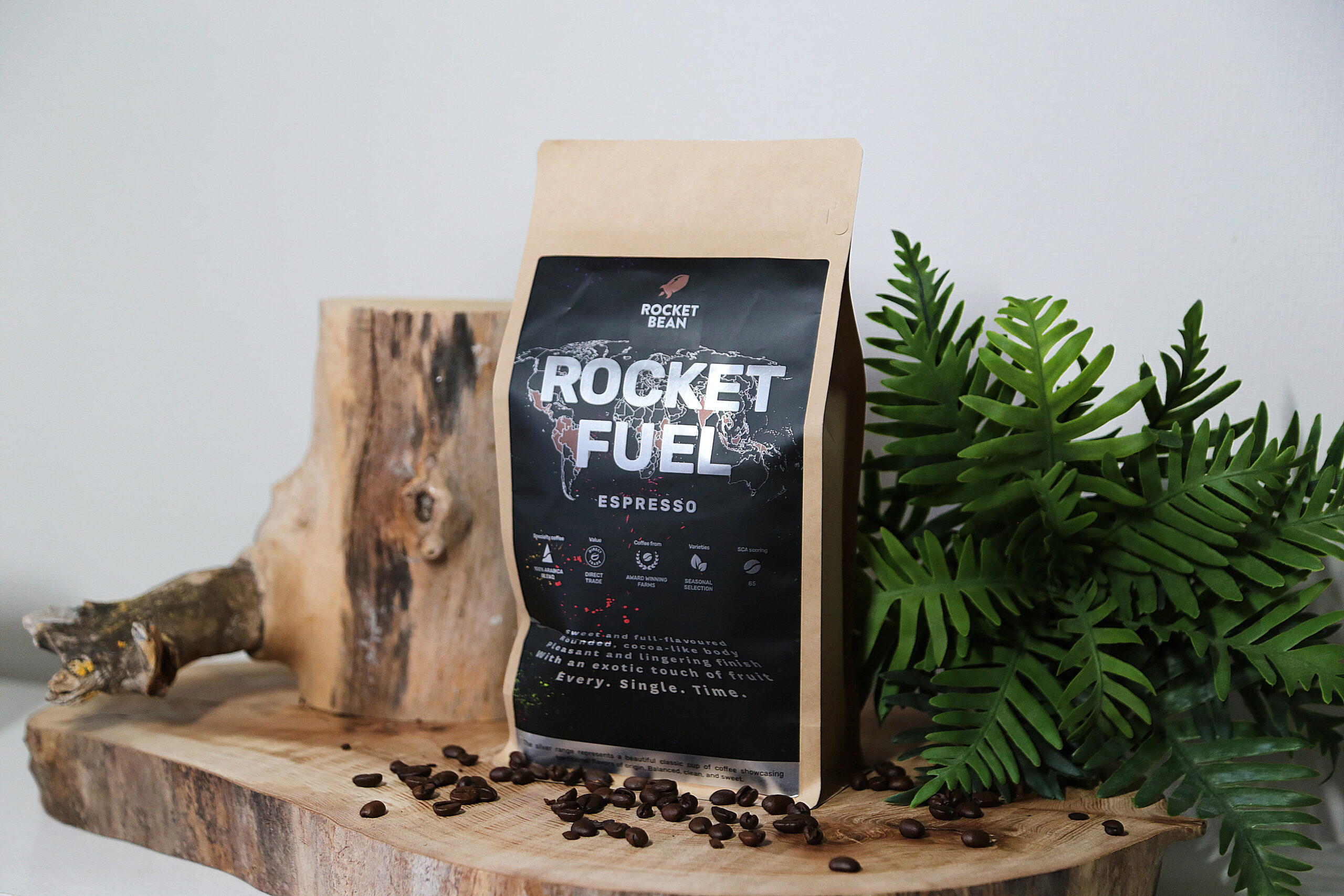 Coffee packaging with a Rocket Fuel sticker printed using digital printing technology.